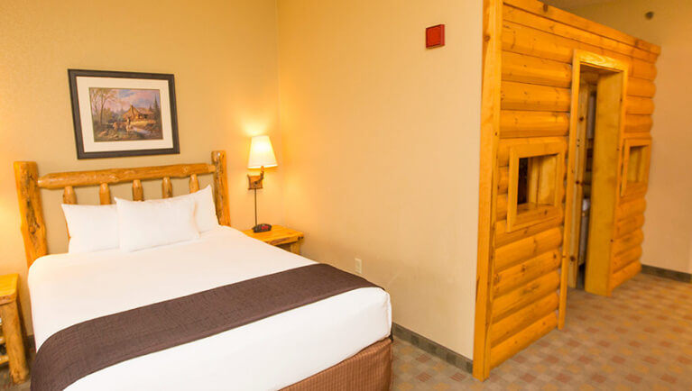 The bed and indoor cabin with bunk beds in the KidCabin Suite 